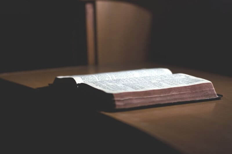 Photo of bible on table.